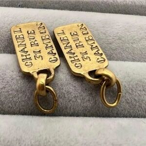 Chanel Vintage Gold Earring Tag Charms includes a COA